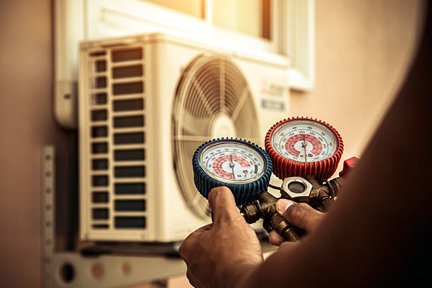 Professional Hvac technician working in Garland, UT